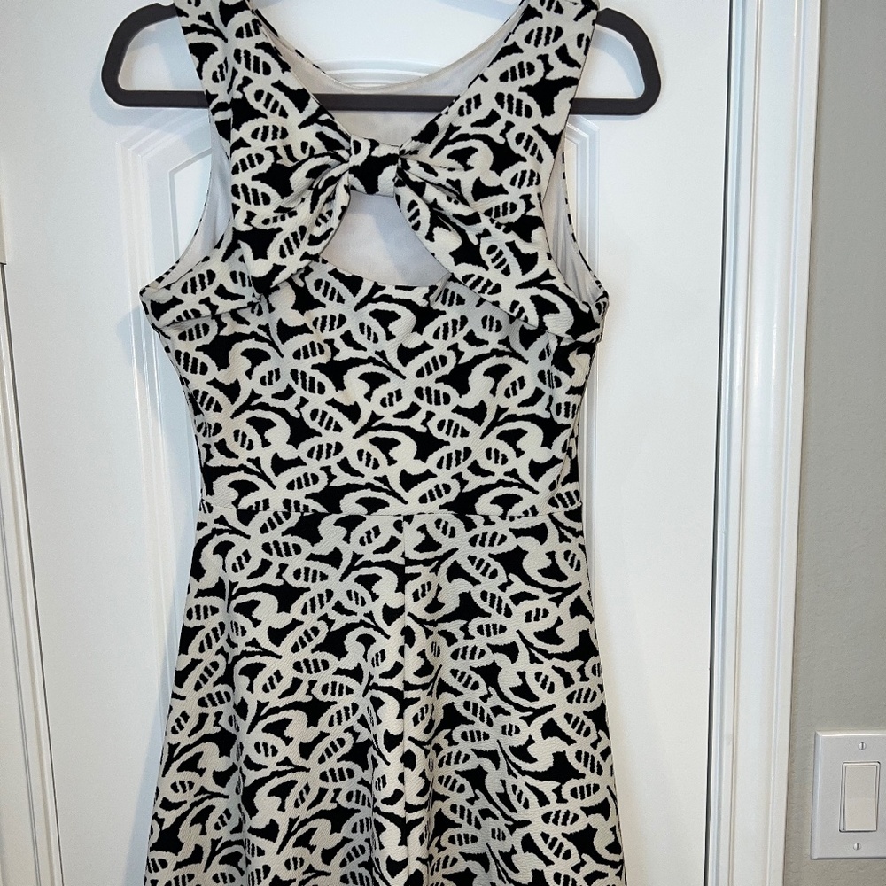 Black and white high neck bow back charming Charlie dress size M